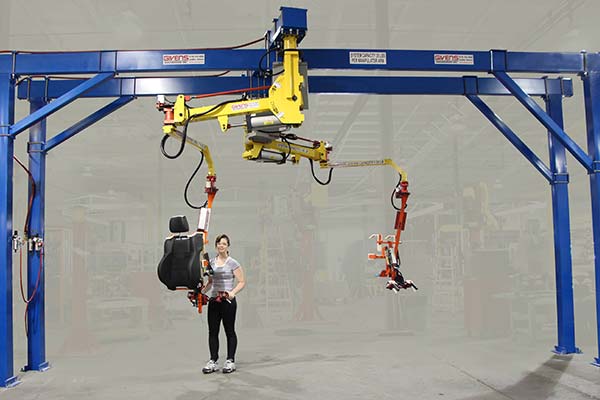 bridge crane with side by side jib crane specially-mounted manipulators for seat transfer system